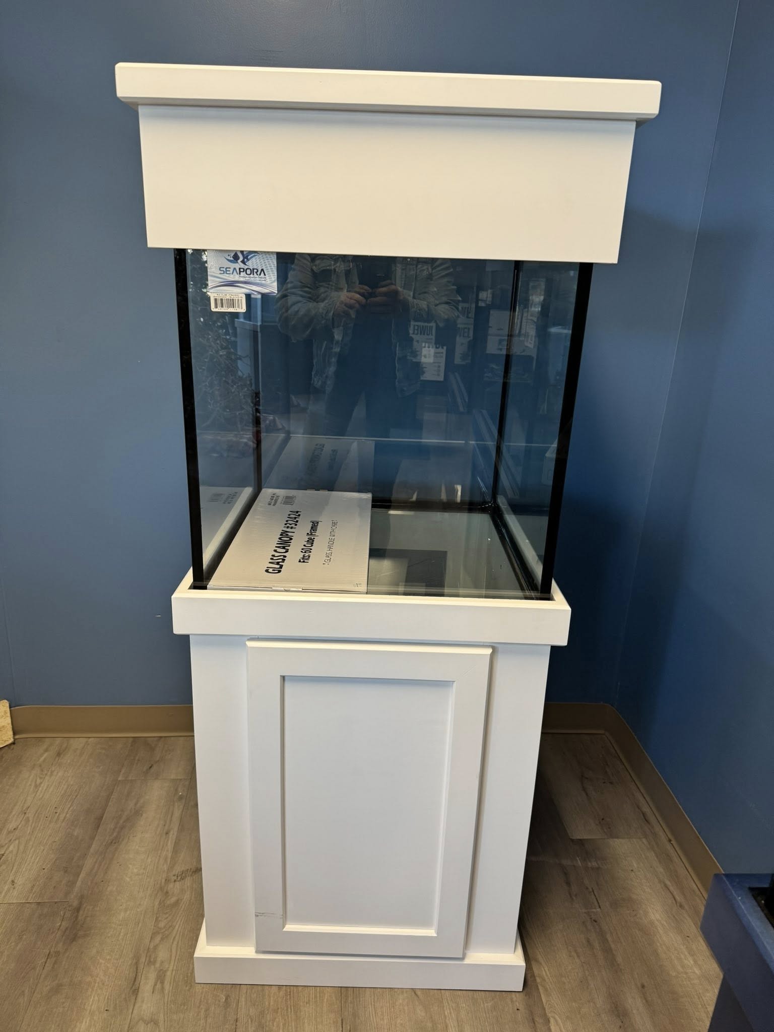 Long dark wood aquarium stand and canopy